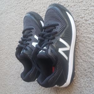 New Balance little kids cleats